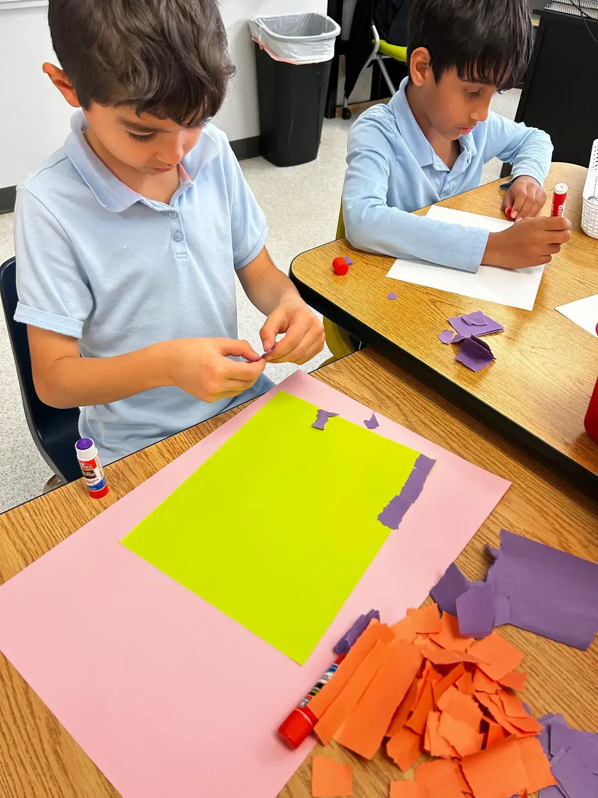 NAML students working on a colorful arts and crafts project